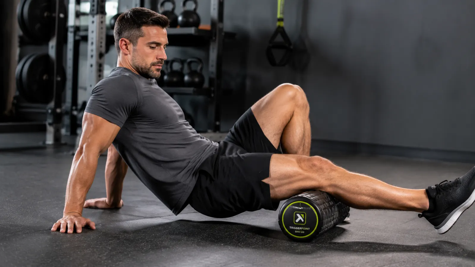 Close-up of the TriggerPoint GRID 2.0 foam roller surface texture showing the multi-density grid pattern
